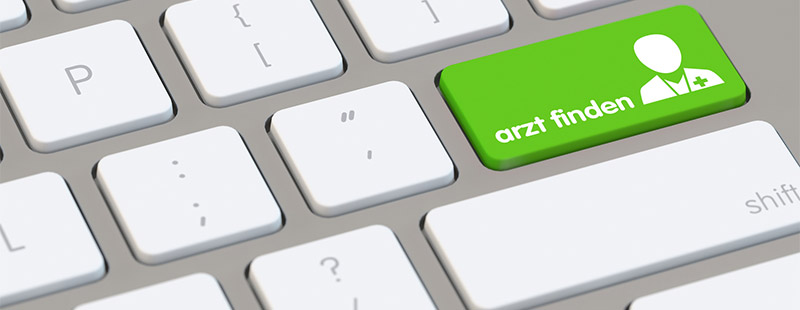 Eine Tastatur mit einer Grünen Taste auf der Arzt finden versehen ist
